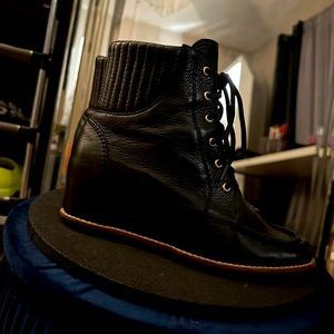 Real leather booties with wedge, worn once, warm for winter too! Like new